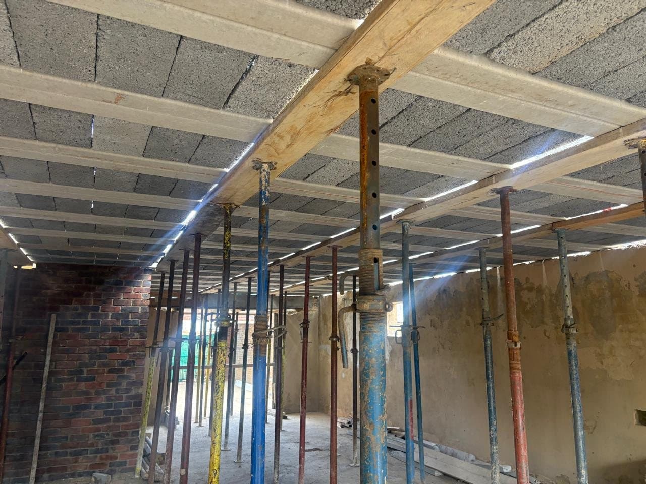 Propping and formwork supporting a suspended slab from below